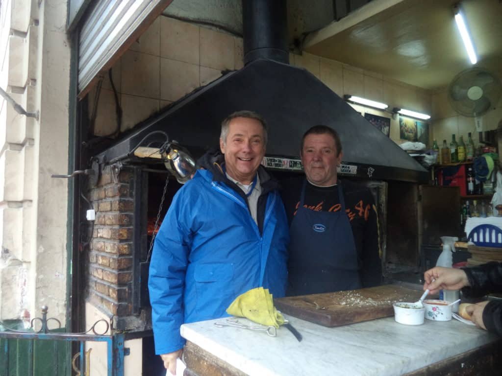 Author with Freddy, celebrity proprietor of San Telmo's most successful parrilla (grill)